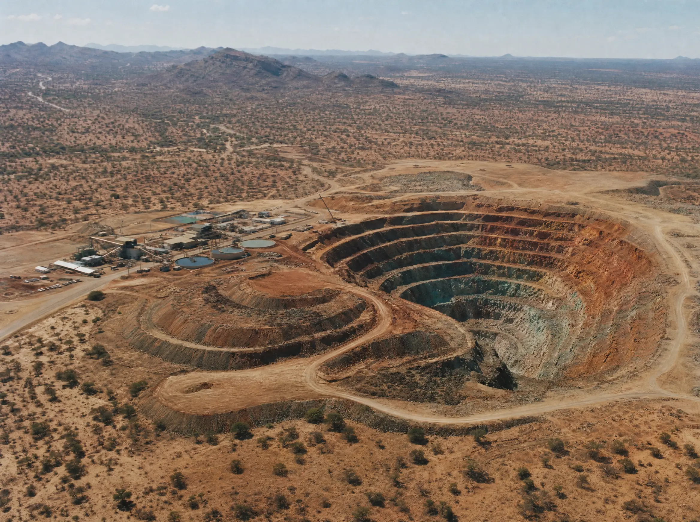 Aerial view of the Kamanjab copper pit and its processing plant in the arid Kunene landscape