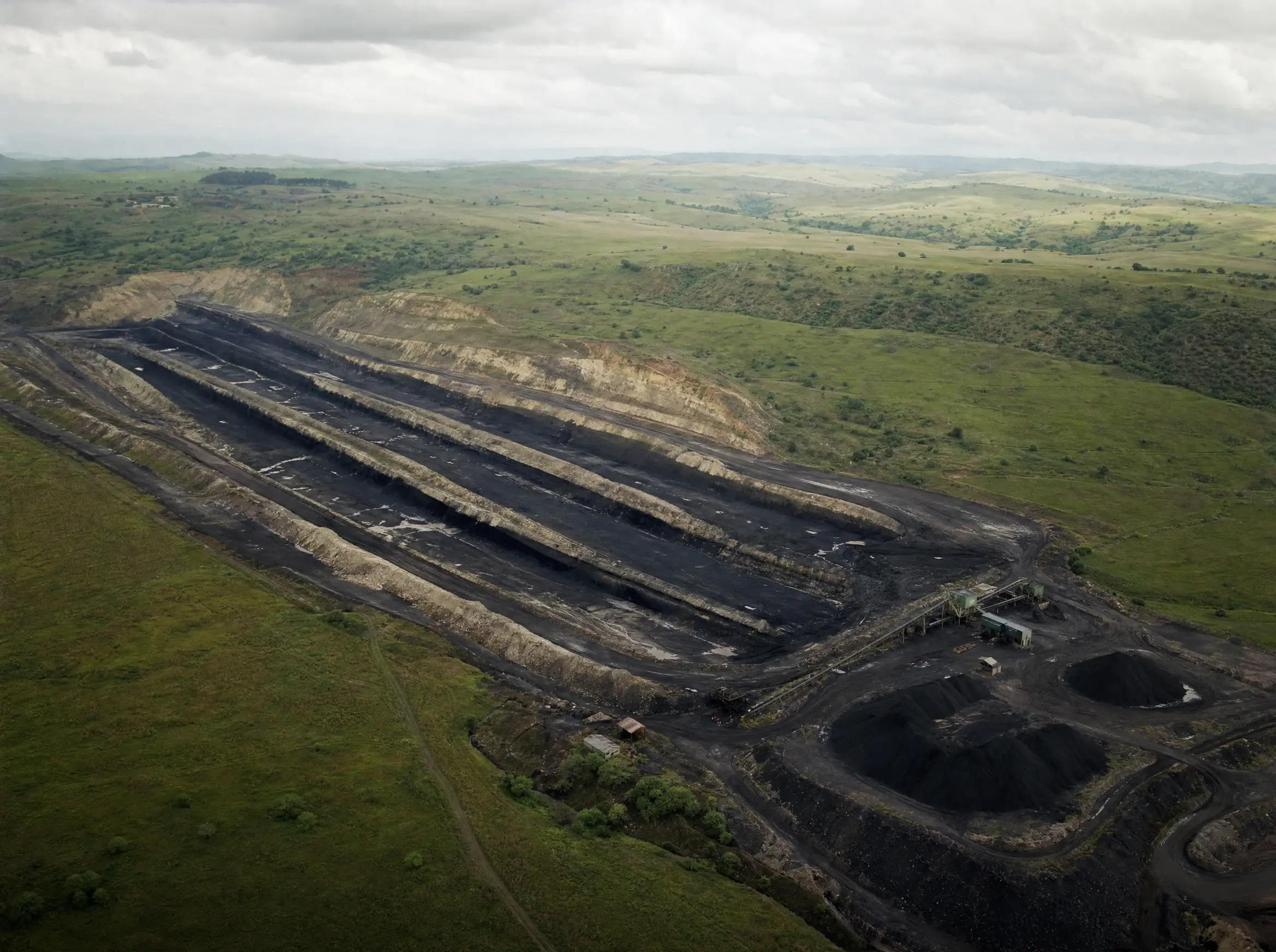 Aerial view of the Natal anthracite strip cuts and wash plant in green KwaZulu-Natal grassland